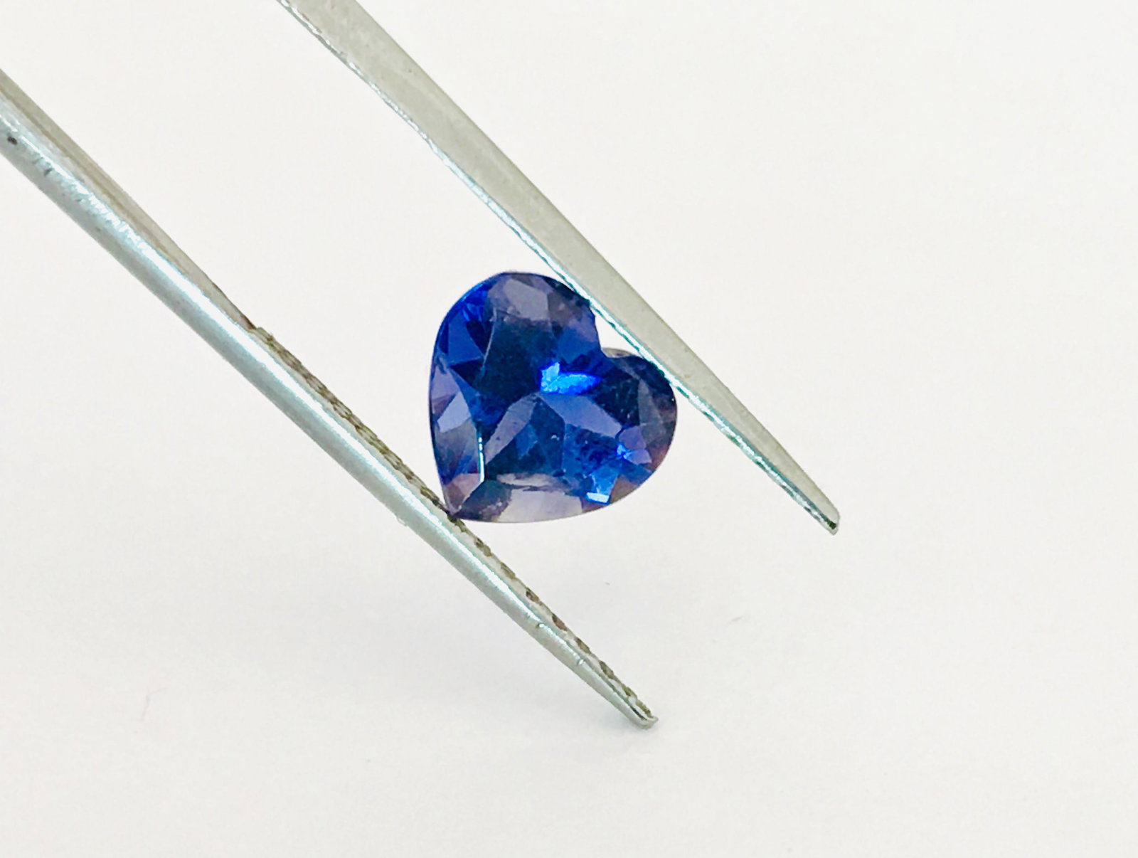 100% Natural AAA 1.50 Carat Loose Tanzanite Gemstone: 100% natural earth born loose tanzanite. 1.50 carat loose tanzanite. Perfect heart shaped gemstone. AAA tanzanite loose stone for setting in fine jewelry like rings, pendants and etc. Tanzanite â€�