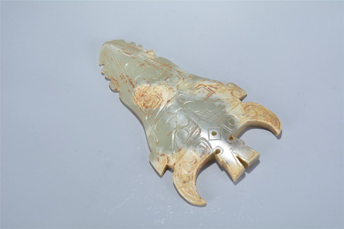 Archaic jade carved weapon figure (1 of 5)
