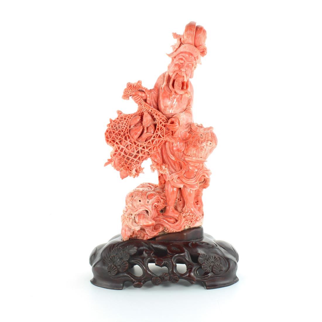 A CHINESE CARVED CORAL STATUE carved in detail to (1 of 1)
