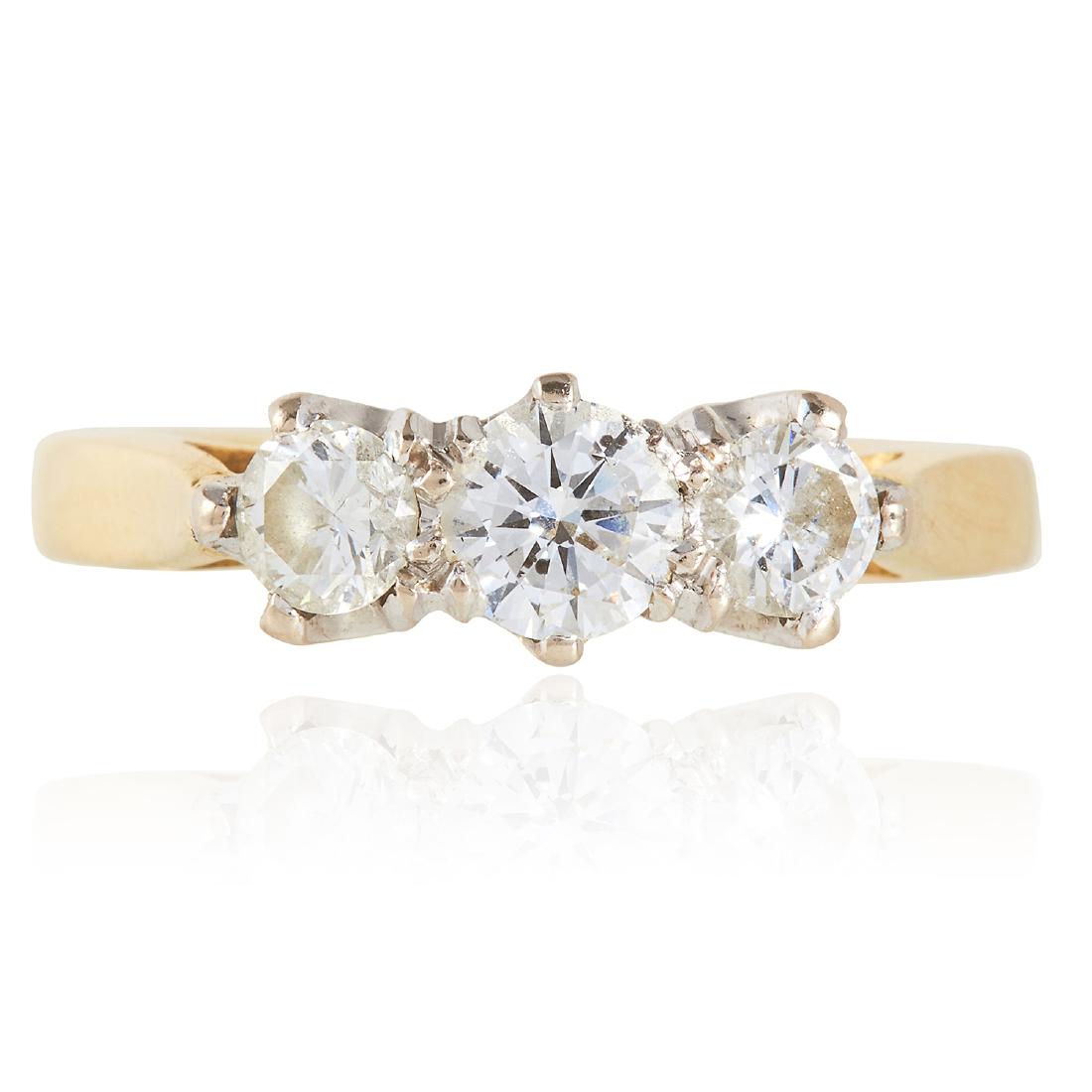 A THREE STONE DIAMOND RING in 18ct yellow gold, set (1 of 1)