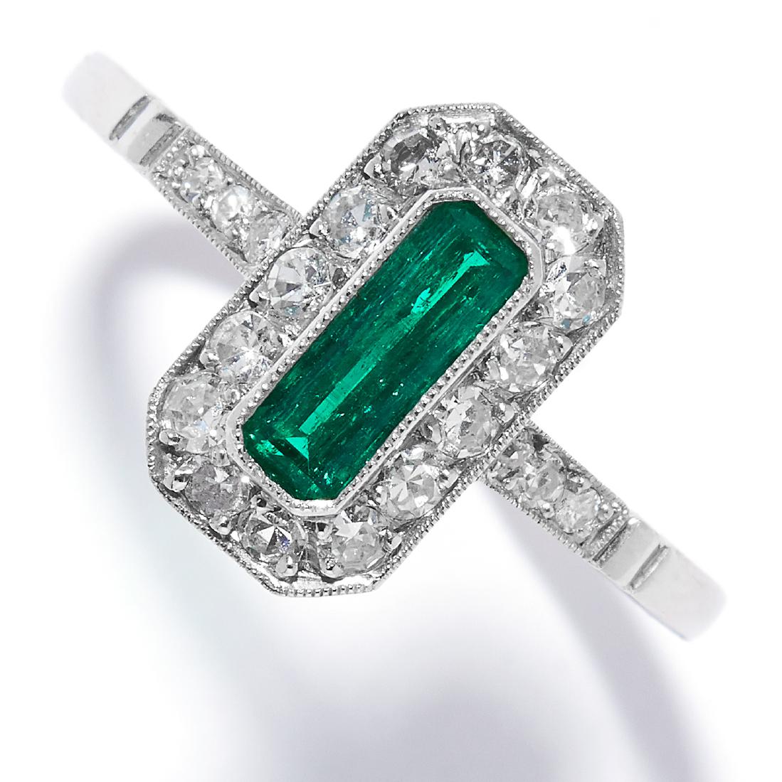 EMERALD AND DIAMOND DRESS RING in platinum, set with an (1 of 1)