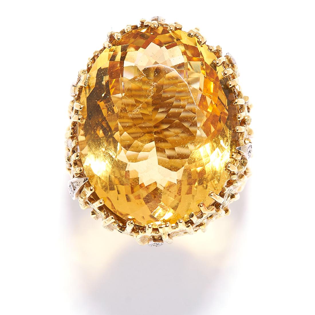 CITRINE AND DIAMOND RING, GRIMA, CIRCA 1972, in 18ct: CITRINE AND DIAMOND RING, GRIMA, CIRCA 1972, in 18ct yellow gold, set with an oval cut citrine in abstract border set with round cut diamonds, signed Grima, British hallmarks, size S / 9, 23.6g.