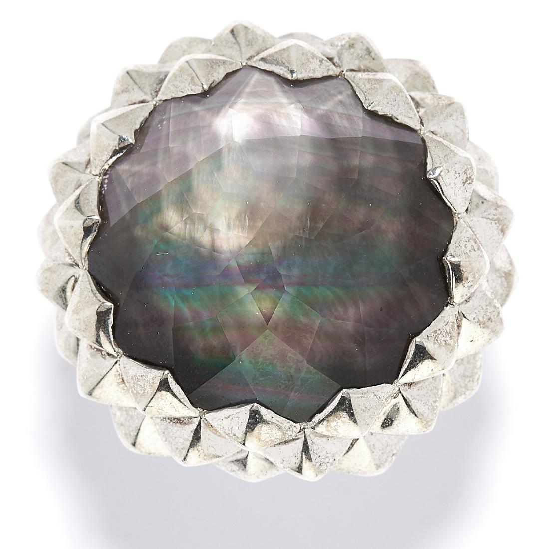 MOTHER OF PEARL AND SMOKEY QUARTZ DRESS RING, STEPHEN: MOTHER OF PEARL AND SMOKEY QUARTZ DRESS RING, STEPHEN WEBSTER in sterling silver, set with mother of pearl and faceted smokey quartz, stamped 925, size M / 6, 29.2g.
