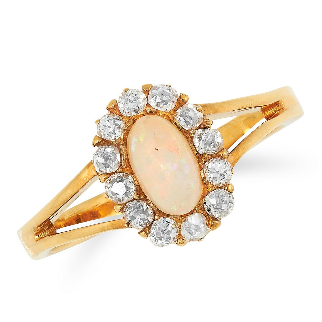 AN ANTIQUE OPAL AND DIAMOND CLUSTER RING set with a (1 of 1)