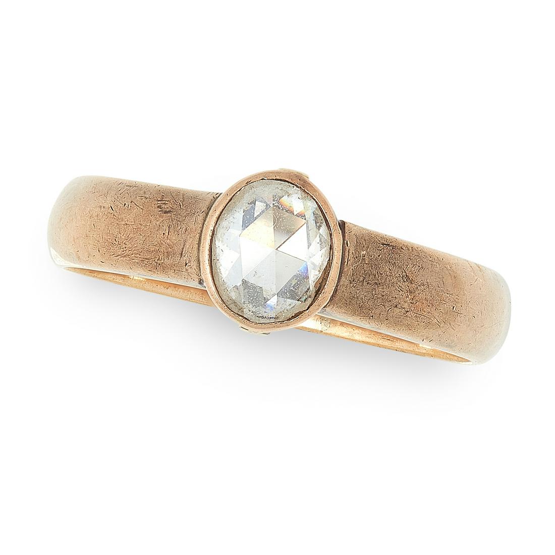 A SOLITAIRE DIAMOND RING in yellow gold, the band set (1 of 1)