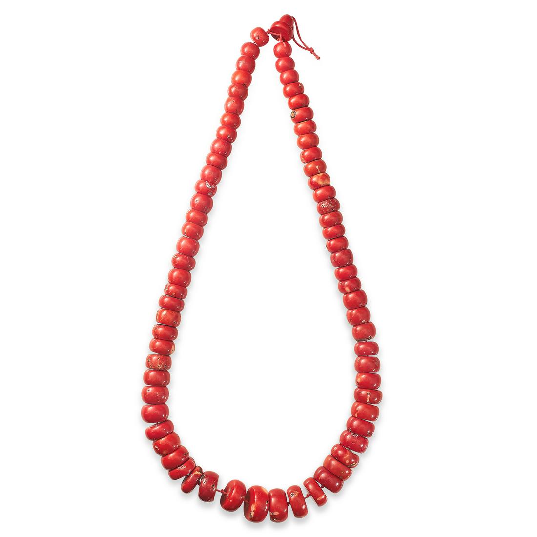 A LARGE CORAL BEAD NECKLACE comprising a row of seventy (1 of 1)