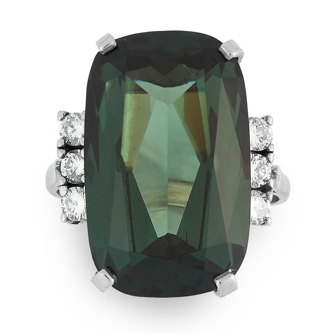 A TOURMALINE AND DIAMOND RING set with a cushion cut (1 of 1)