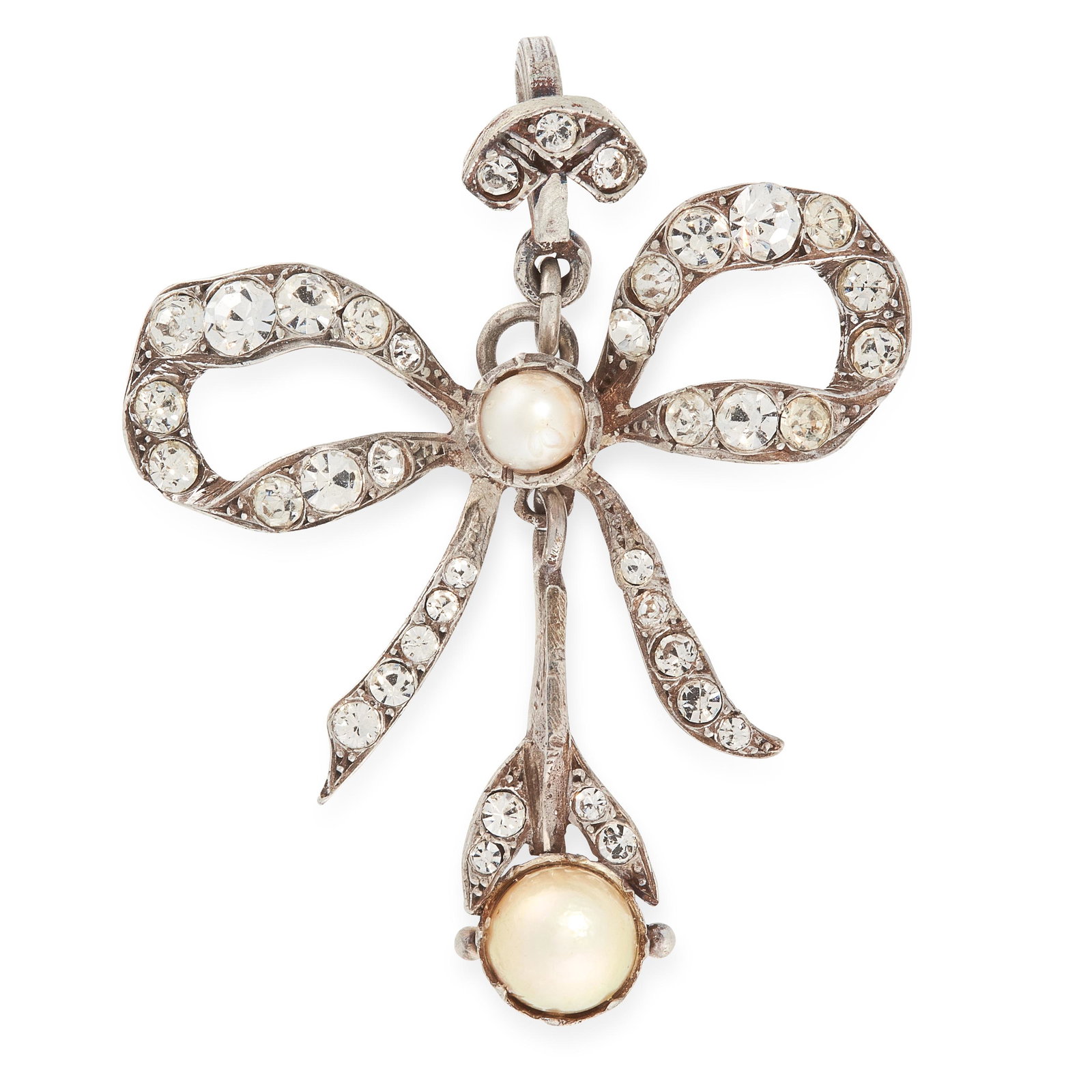 A PEARL AND PASTE RIBBON AND BOW PENDANT in silver, in: A PEARL AND PASTE RIBBON AND BOW PENDANT in silver, in the form of a ribbon and bow, set with round cut white paste gemstones and pearls, unmarked, 4.7cm, 8.7g.