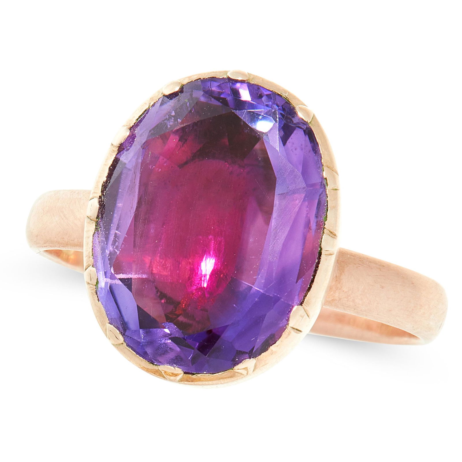 AN AMETHYST DRESS RING in yellow gold, set with an oval (1 of 1)