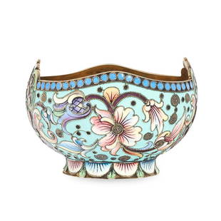 AN ANTIQUE IMPERIAL RUSSIAN ENAMEL SALT CELLAR / BOWL,: AN ANTIQUE IMPERIAL RUSSIAN ENAMEL SALT CELLAR / BOWL, NIKOLAI ZORIN MOSCOW CIRCA 1910 in 84 zolotnik silver, the body decorated allover with geometric and floral designs relieved in enamel, NZ maker'