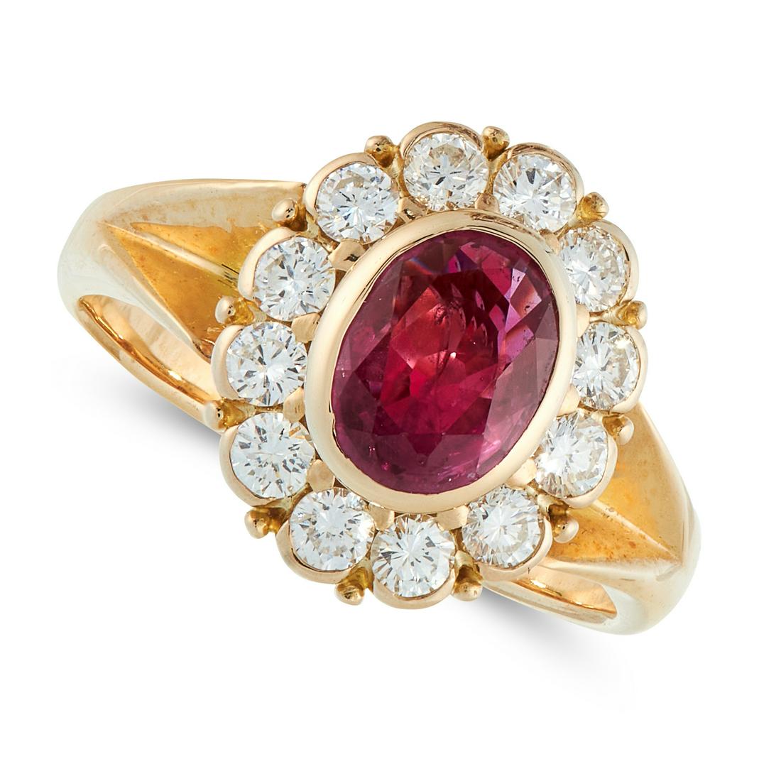 RUBY AND DIAMOND CLUSTER RING set with an oval cut ruby (1 of 1)