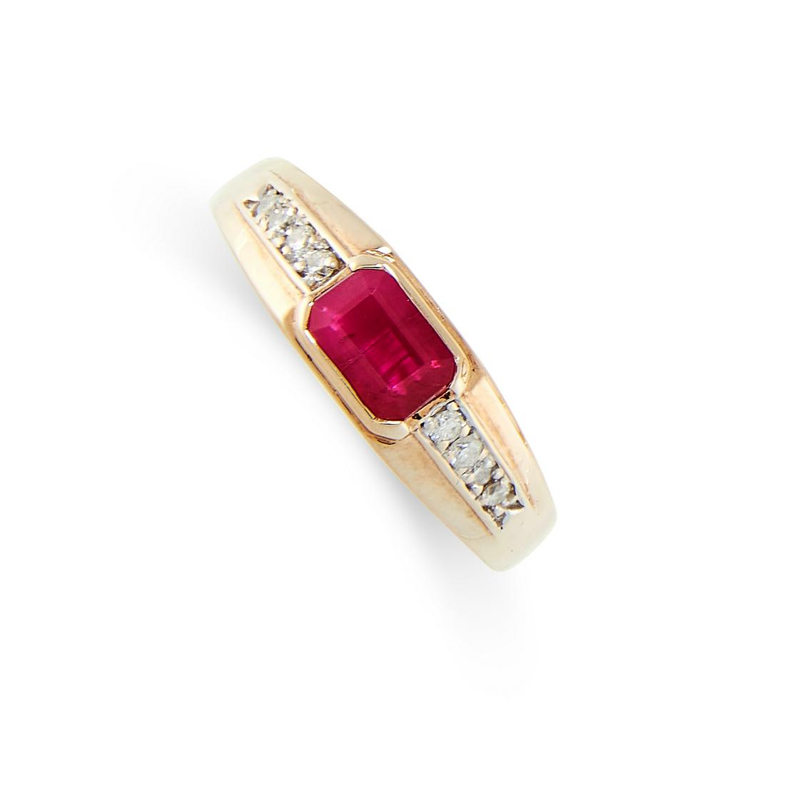 A RUBY AND DIAMOND RING in 9ct yellow gold, set with an (1 of 2)