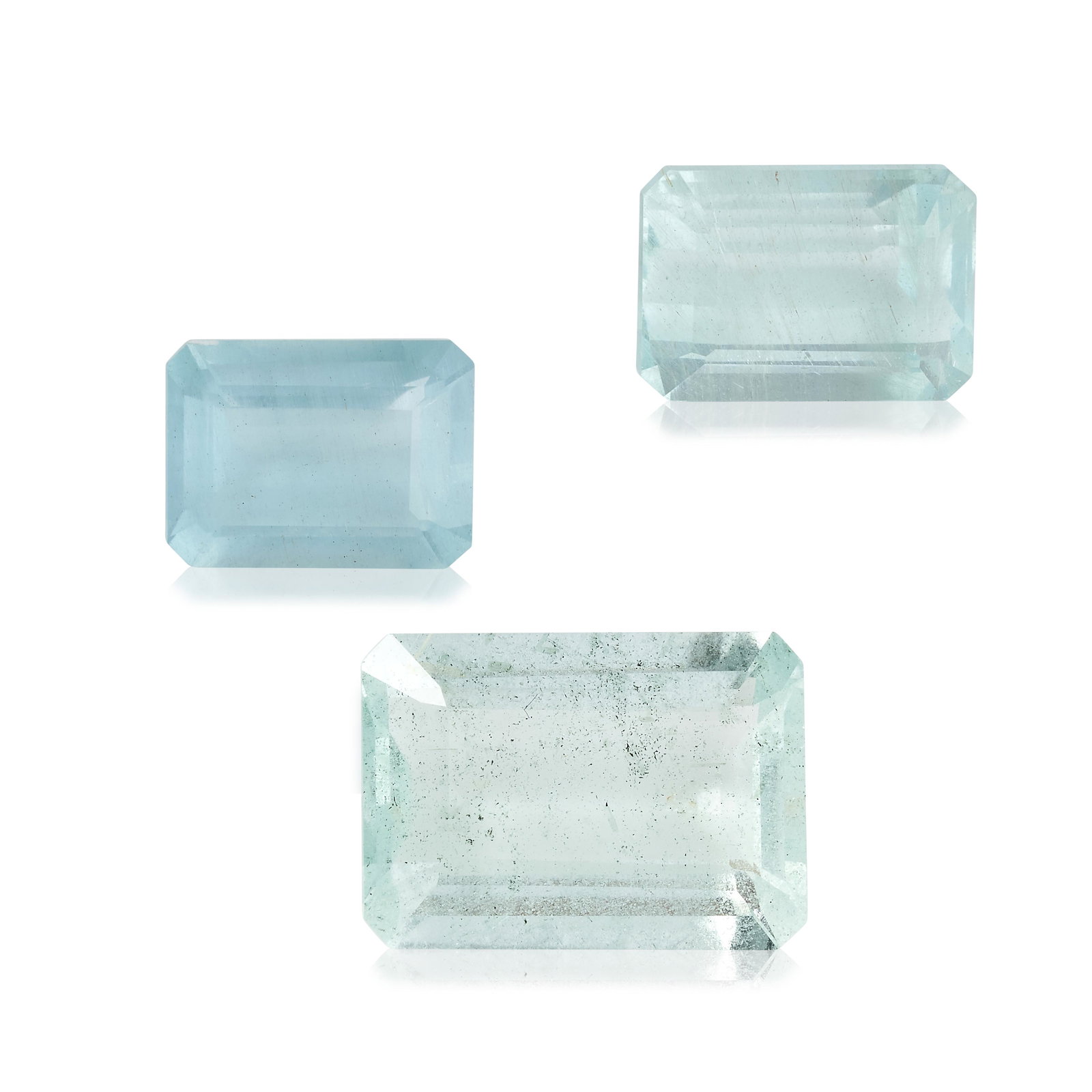 THREE UNMOUNTED AQUAMARINES  Step-cut, approximate (1 of 1)