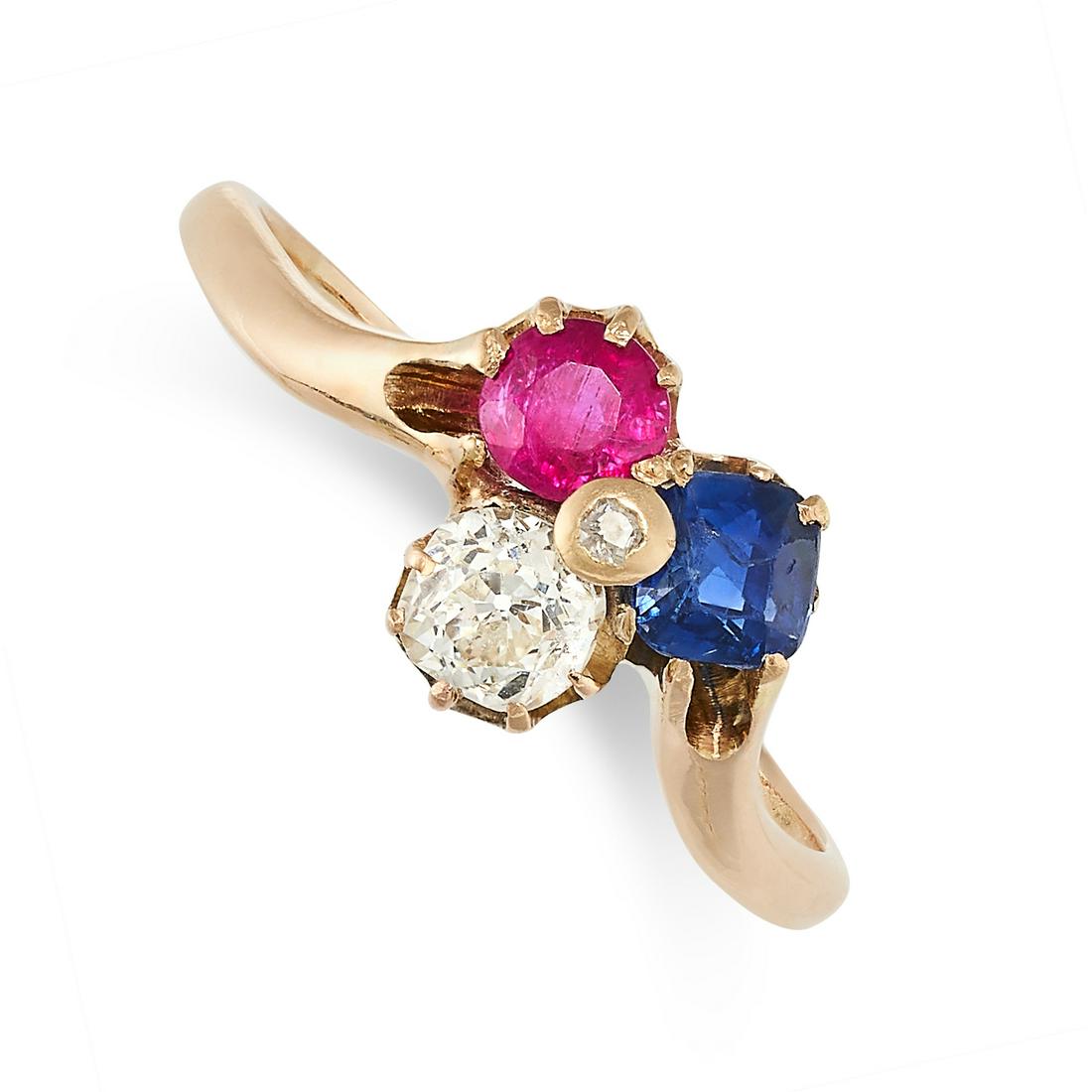 AN ANTIQUE RUBY, SAPPHIRE AND DIAMOND RING in yellow gold, in trefoil design, set with a cushion cut (1 of 2)