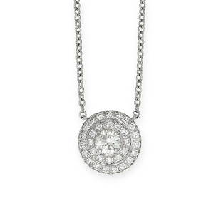 TIFFANY & CO, A DIAMOND SOLESTE PENDANT NECKLACE in platinum, the circular pendant set with a round: TIFFANY & CO, A DIAMOND SOLESTE PENDANT NECKLACE in platinum, the circular pendant set with a round brilliant cut diamond within a two-row border of further round brilliant cut diamonds, the central