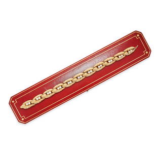 CARTIER, A VINTAGE DIAMOND BRACELET in 18ct yellow gold, the textured links set with pairs of round: CARTIER, A VINTAGE DIAMOND BRACELET in 18ct yellow gold, the textured links set with pairs of round brilliant cut diamonds, the diamonds all totalling 2.2-2.5 carats, in a Cartier leather case,