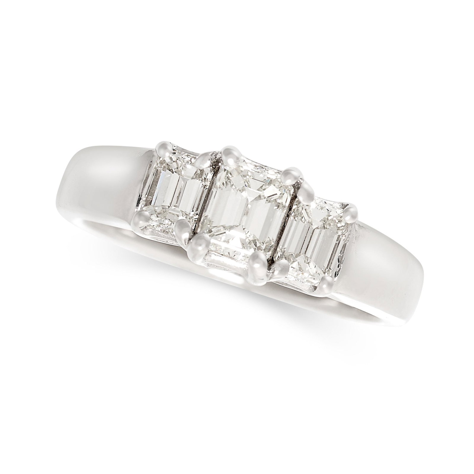 A DIAMOND THREE STONE RING the tapering band set with a trio of graduated emerald cut diamonds, the (1 of 2)