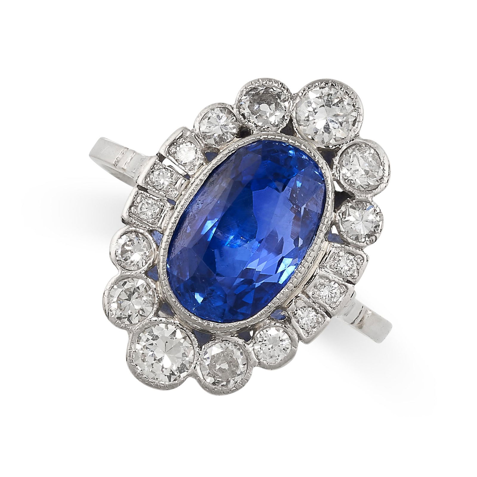 A BURMA NO HEAT SAPPHIRE AND DIAMOND RING set with a cushion cut blue sapphire of 4.18 carats, (1 of 2)