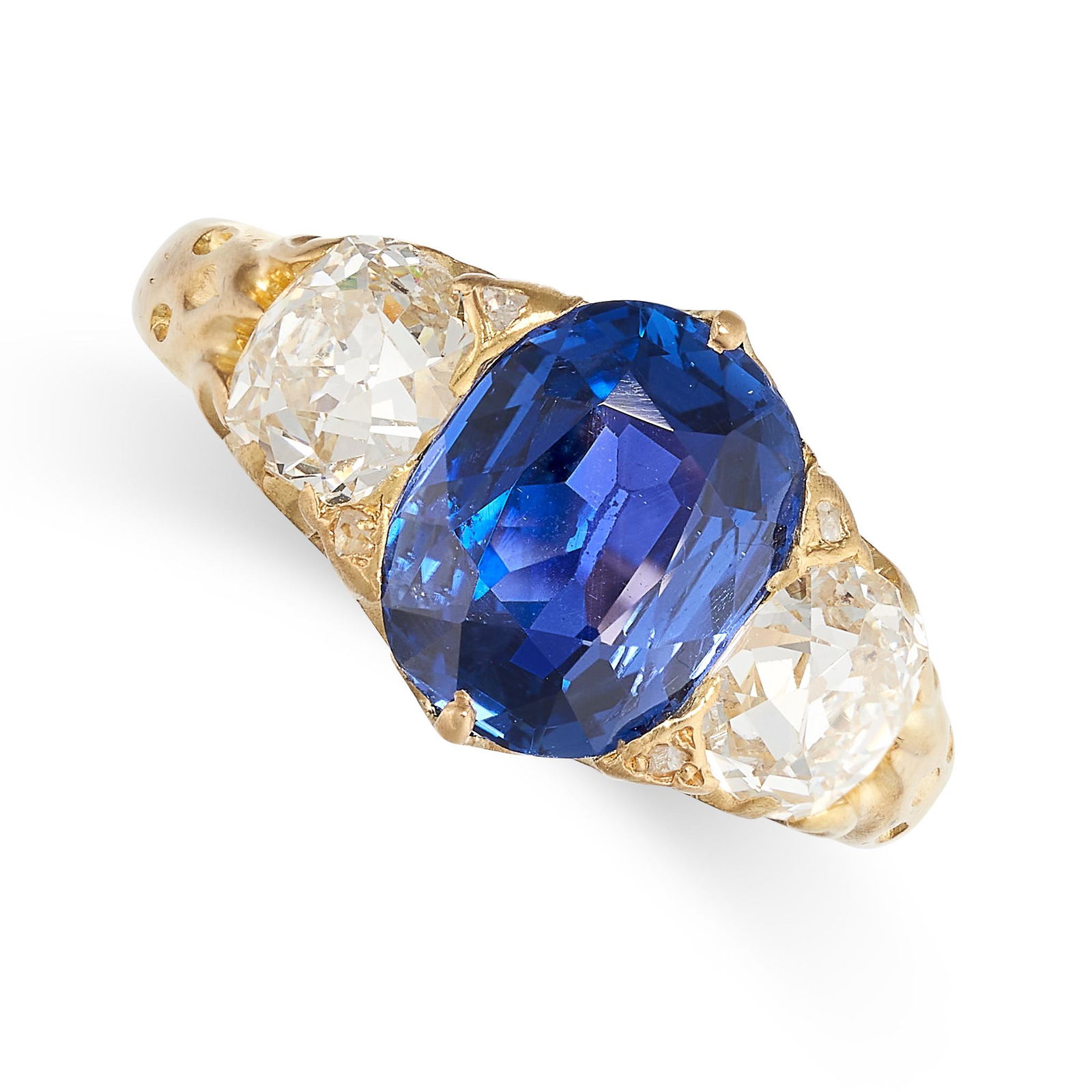 A SAPPHIRE AND DIAMOND THREE STONE RING in yellow gold, set with a cushion cut blue sapphire of 3.02 (1 of 1)