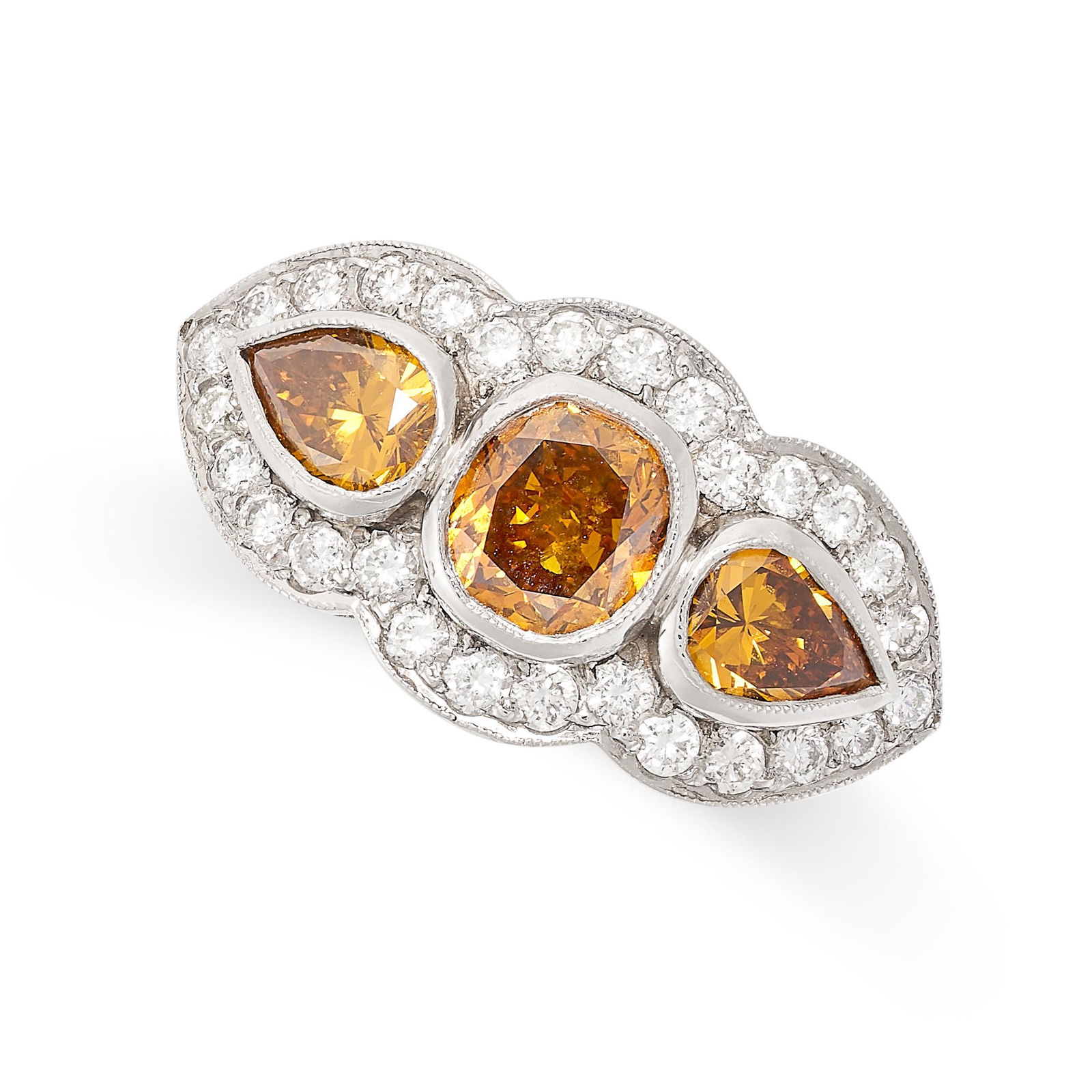 A BROWN DIAMOND DRESS RING in platinum, set with a round cut brown diamond between two pear cut (1 of 2)