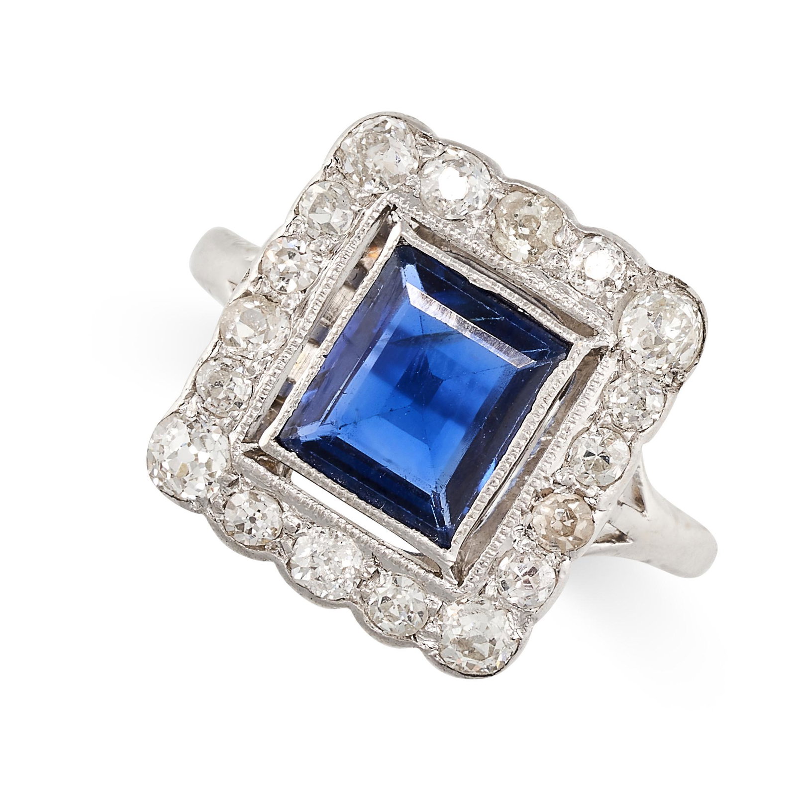 A SAPPHIRE AND DIAMOND RING set with a rectangular step cut blue sapphire of 1.24 carats within a (1 of 1)