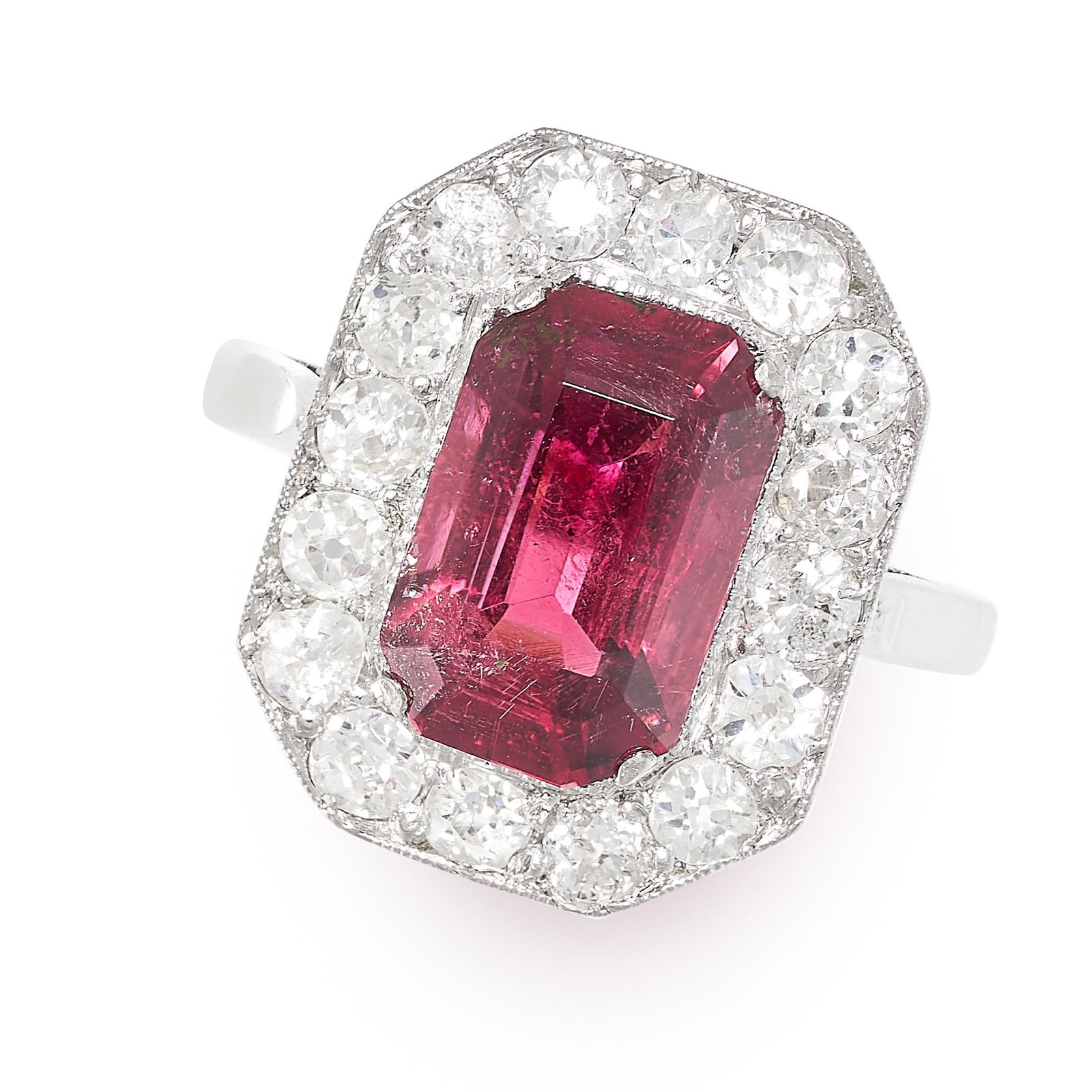 A TOURMALINE AND DIAMOND RING set with an octagonal cut tourmaline of 2.97 carats in a border of old (1 of 2)