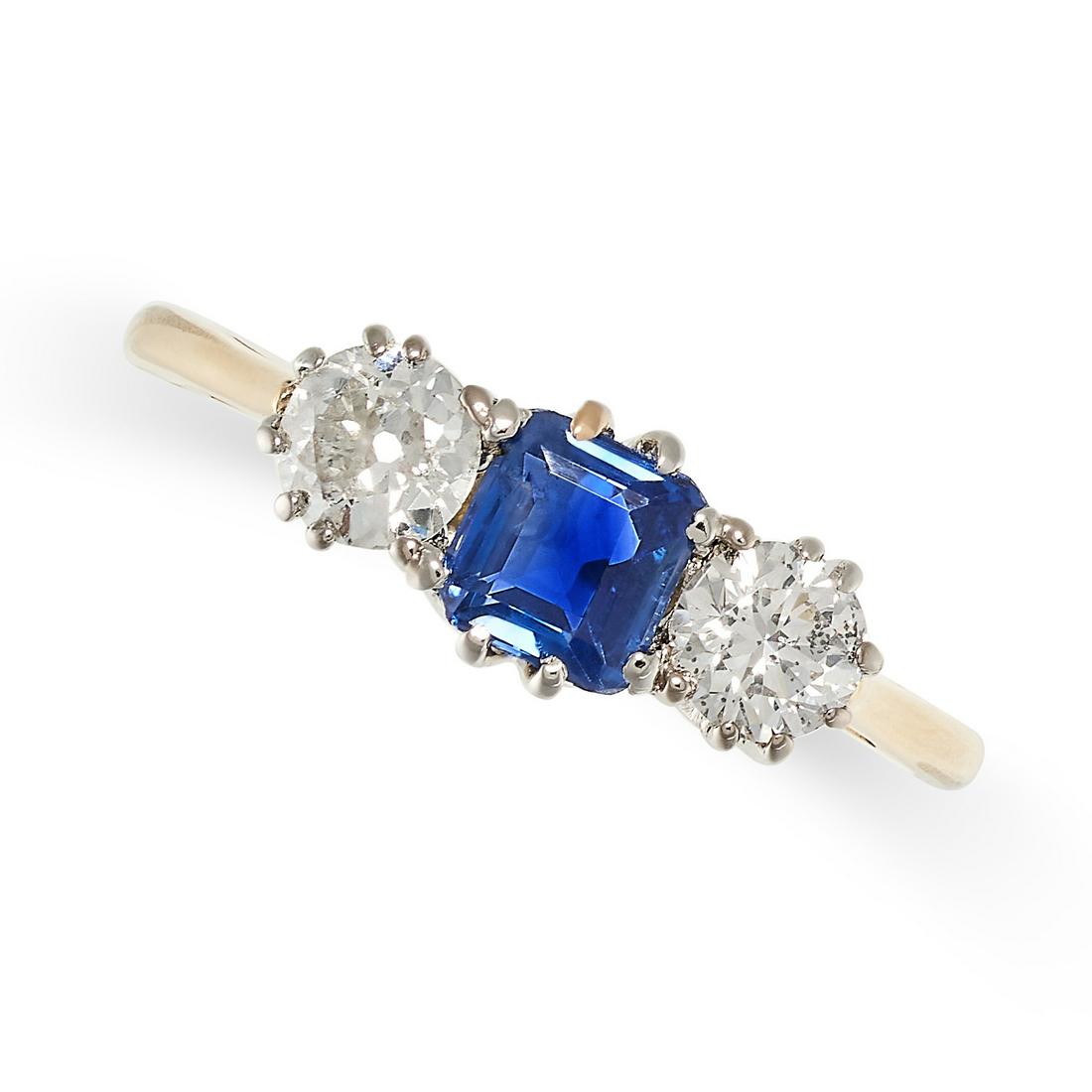 A SAPPHIRE AND DIAMOND RING set with an octagonal step cut sapphire of 0.62 carats accented on each (1 of 2)