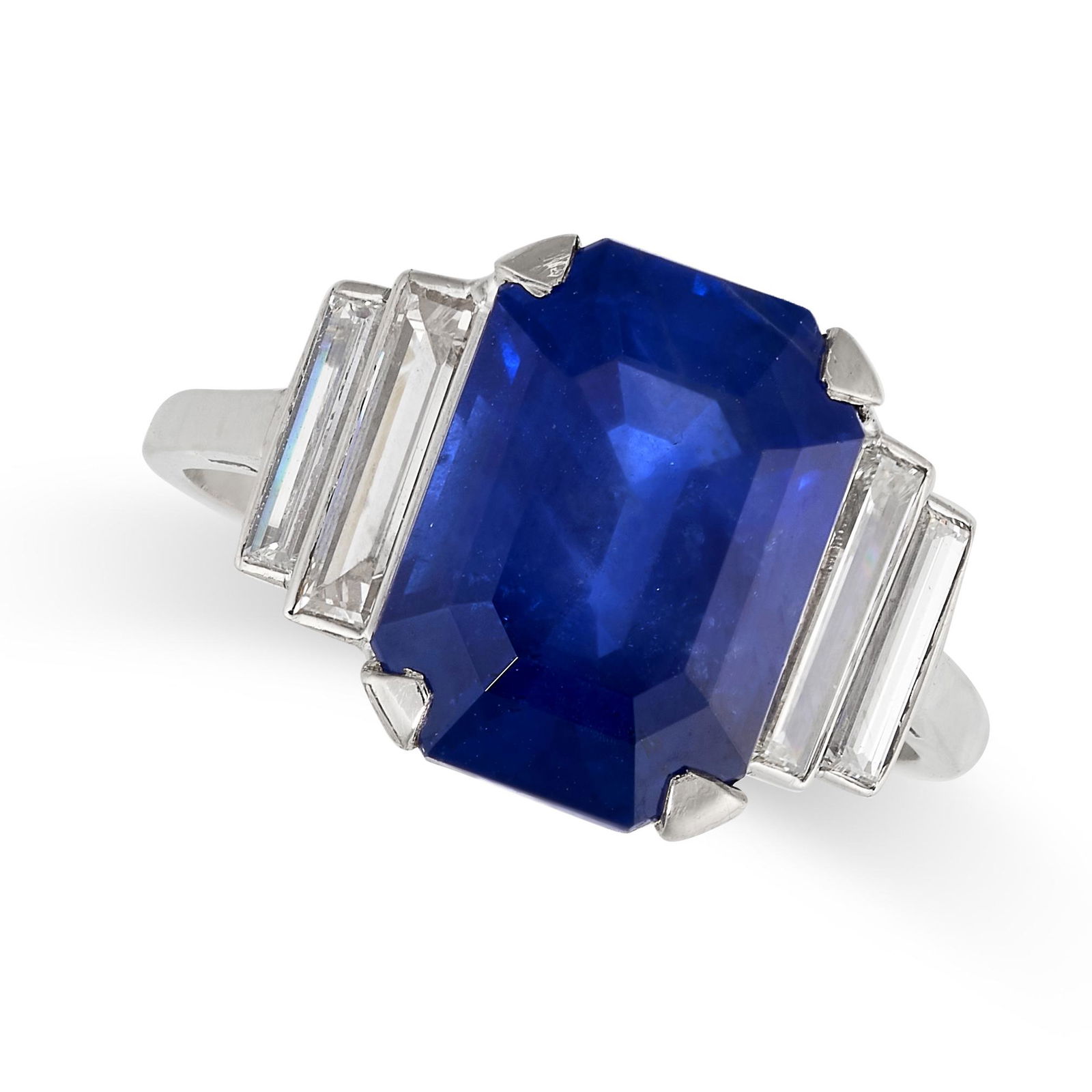 AN ART DECO SAPPHIRE AND DIAMOND DRESS RING in platinum, set with an emerald cut blue sapphire of (1 of 1)