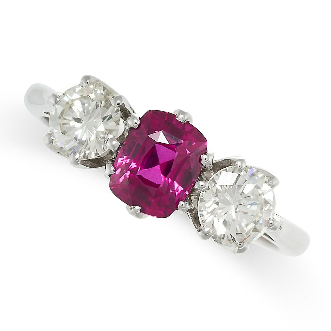 AN UNHEATED RUBY AND DIAMOND THREE STONE RING in 18ct white gold, set with a cushion cut ruby of (1 of 2)