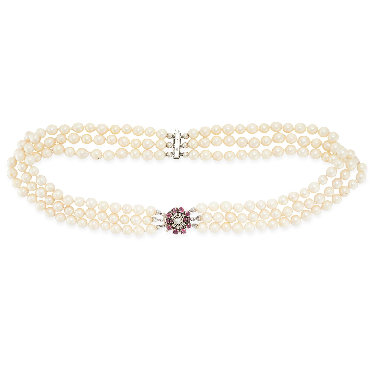 A PEARL, RUBY AND DIAMOND NECKLACE comprising three rows of pearls, the clasp set with a round (1 of 1)