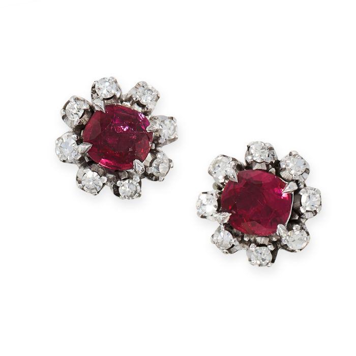 A PAIR OF UNHEATED RUBY AND DIAMOND EARRINGS each set with a cushion cut ruby, both totalling 1.30 (1 of 1)