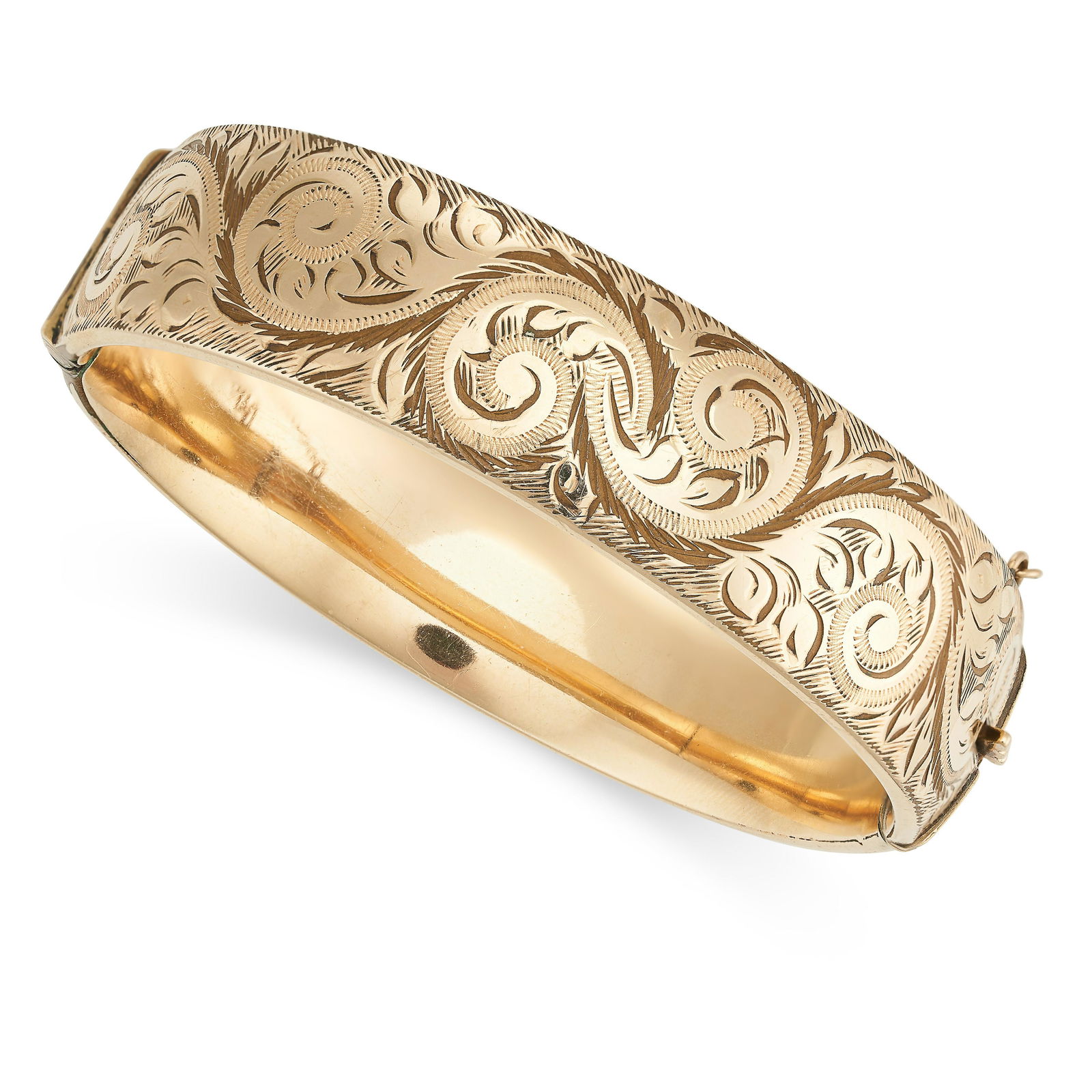 A VINTAGE ENGRAVED BANGLE the hinged body decorated with engraved scrolling foliate designs, stamped (1 of 1)
