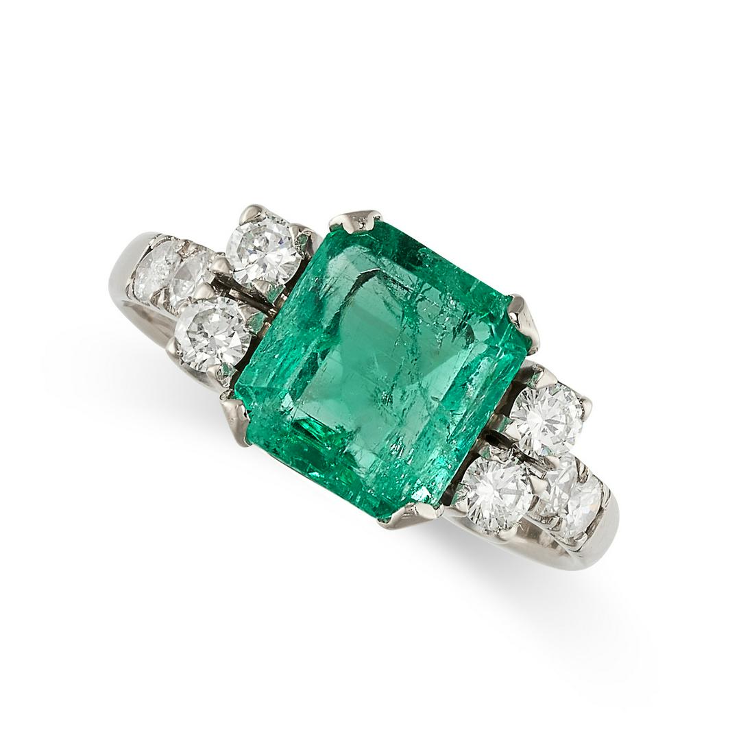 A COLOMBIAN EMERALD AND DIAMOND RING in 18ct white gold, set with an octagonal cut emerald of 1.47 (1 of 2)