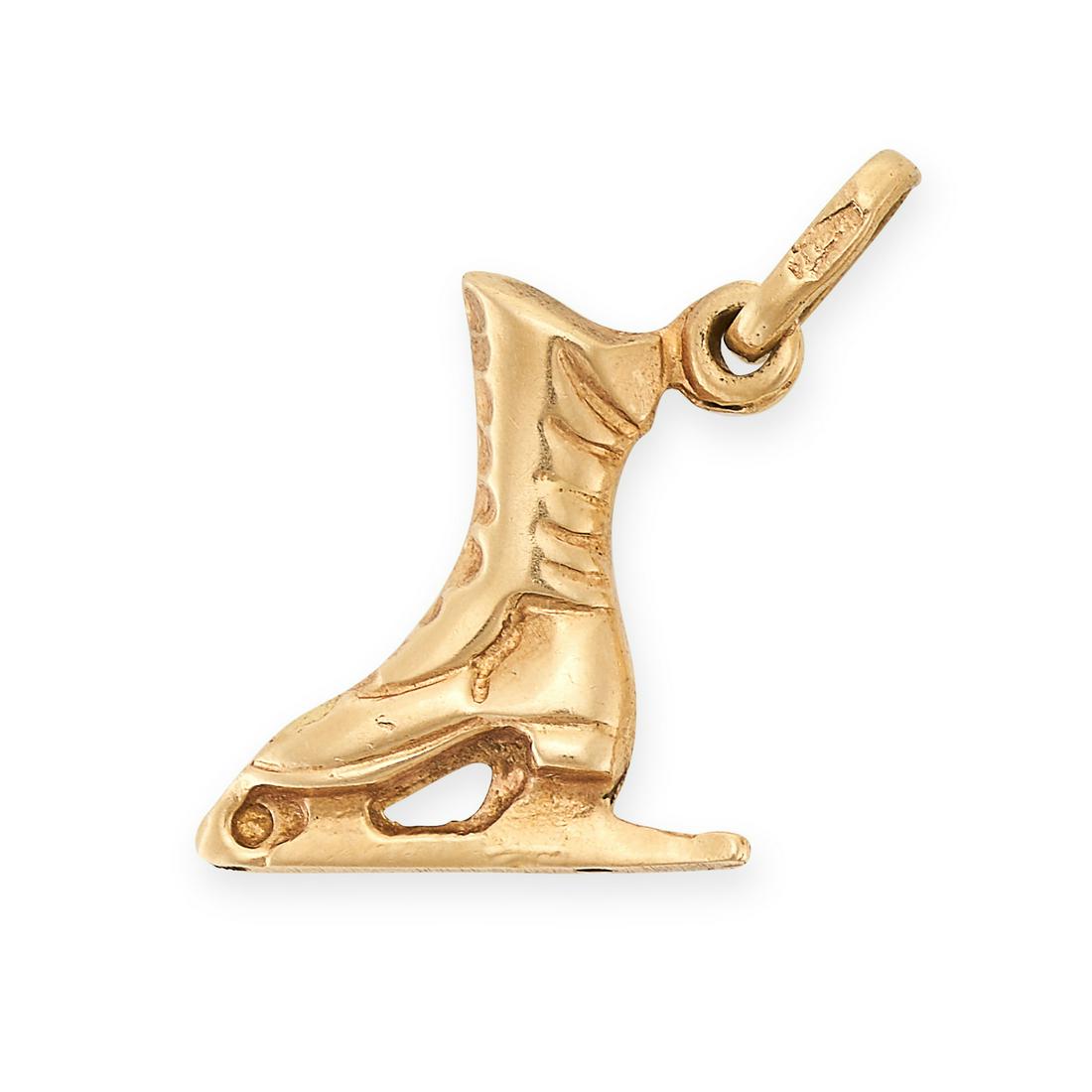 A VINTAGE ICE SKATE CHARM/PENDANT in 18ct yellow gold, designed as an ice skate, stamped 750, 1.5cm, (1 of 1)