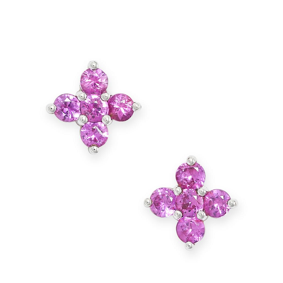 CARL BUCHERER, A PAIR OF RUBY CLUSTER STUD EARRINGS in 18ct white gold, each set with five round cut (1 of 1)