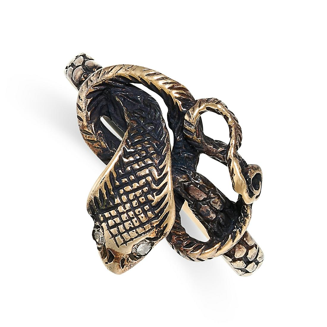 A DIAMOND SNAKE RING designed as a coiled cobra, each eye set with a rose cut diamond, no assay: A DIAMOND SNAKE RING designed as a coiled cobra, each eye set with a rose cut diamond, no assay marks, size L / 6, 1.9g.