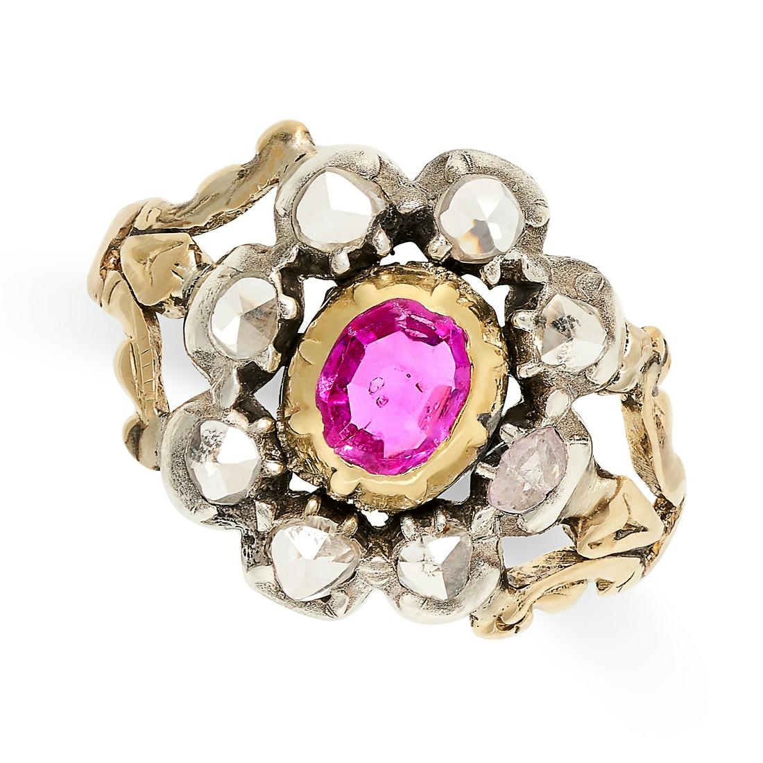 AN ANTIQUE RUBY AND DIAMOND CLUSTER RING in yellow gold and silver, set with an oval ruby in a (1 of 1)
