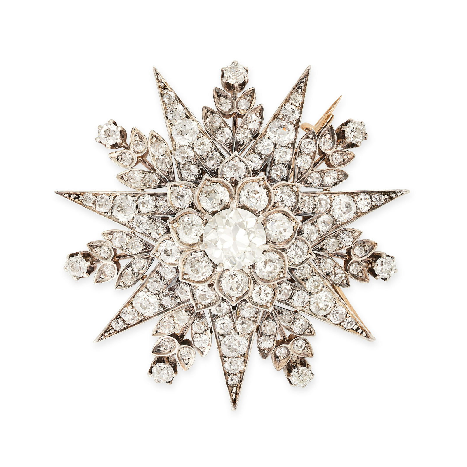 A FINE ANTIQUE DIAMOND STAR BROOCH / PENDANT in yellow gold and silver, designed as a seven rayed st (1 of 1)