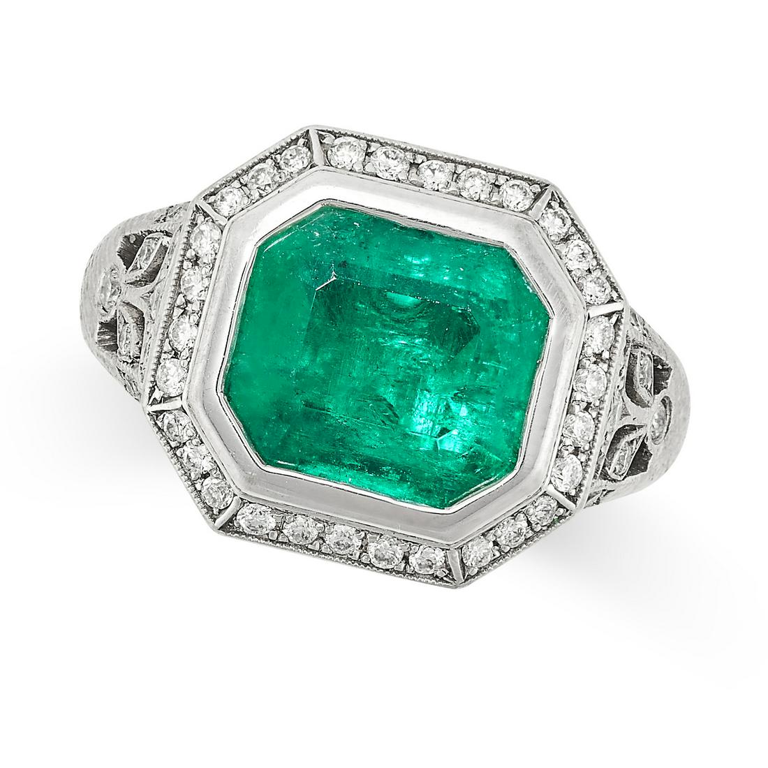 AN EMERALD AND DIAMOND RING in 18ct white gold, set with an octagonal cut emerald of 2.33 carats in (1 of 2)