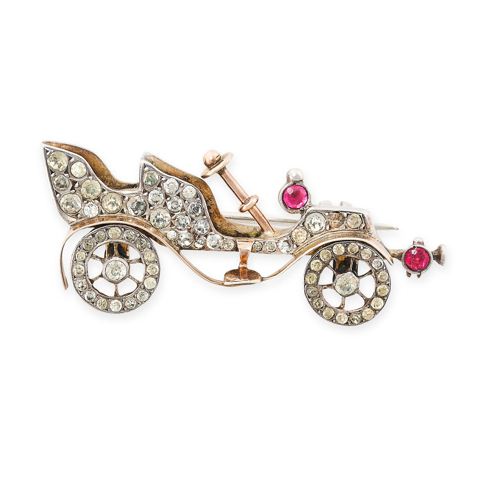 AN ART DECO PASTE MOTOR CAR BROOCH, EARLY 20TH CENTURY in yellow gold and silver, jewelled with (1 of 1)