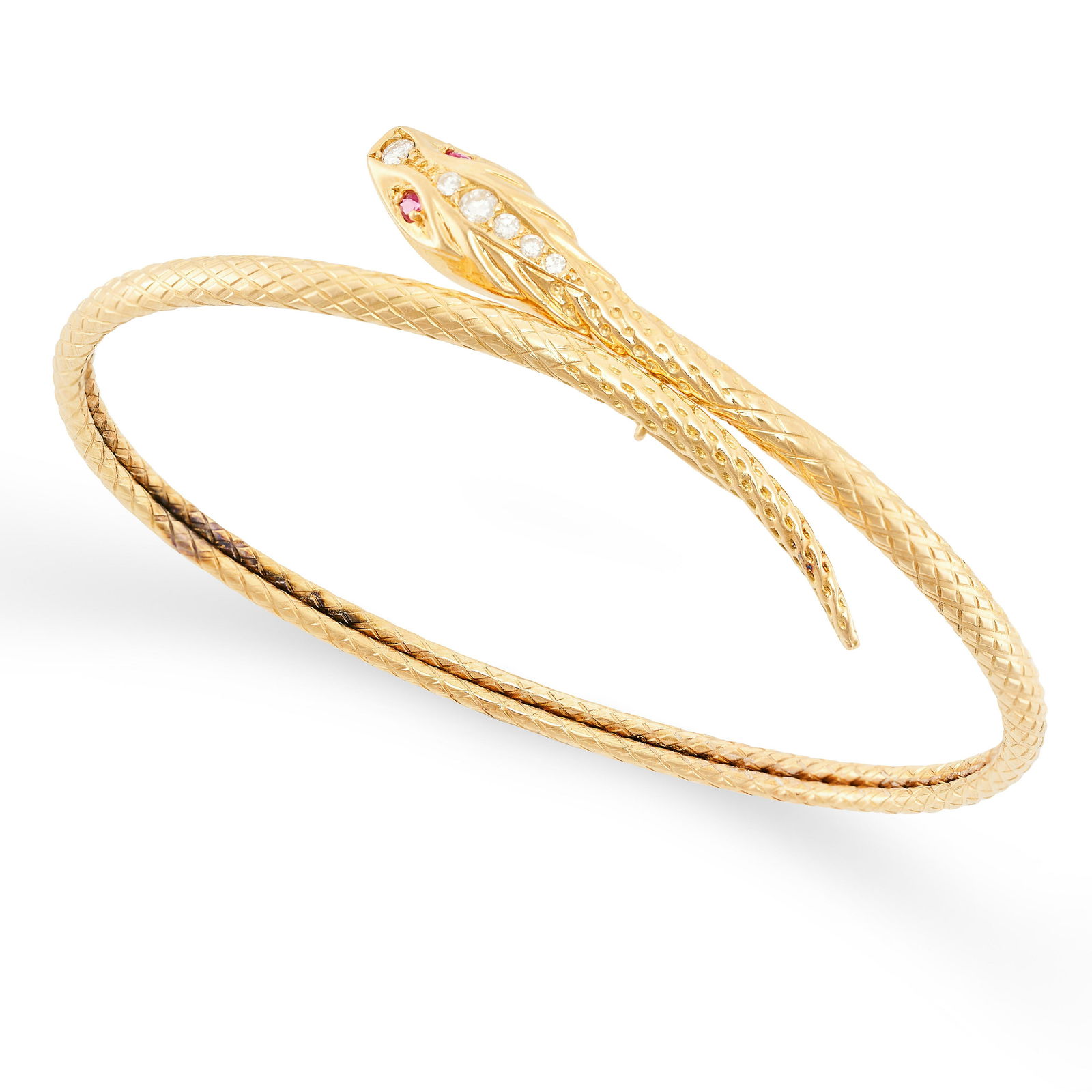 A RUBY AND DIAMOND SNAKE BANGLE in yellow gold, designed as a coiled snake, the head set with round (1 of 1)