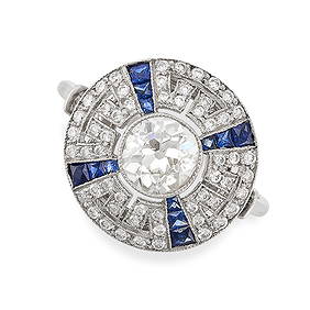 A SAPPHIRE AND DIAMOND RING in Art Deco style, set with an old European cut diamond of 1.00 carat in (1 of 2)