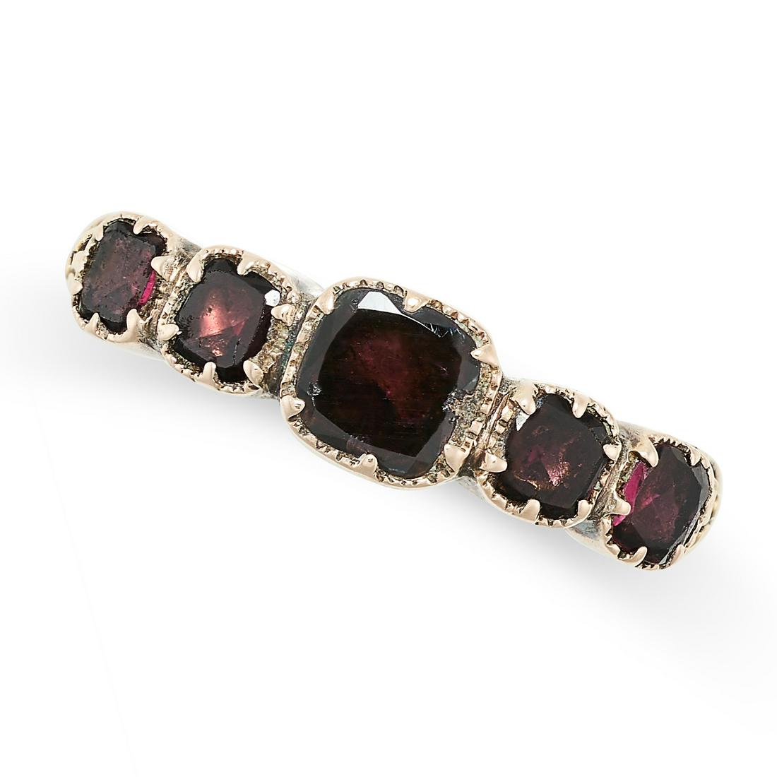 AN ANTIQUE GARNET RING in yellow gold, set with five cushion cut garnets, no assay marks, size L / (1 of 2)