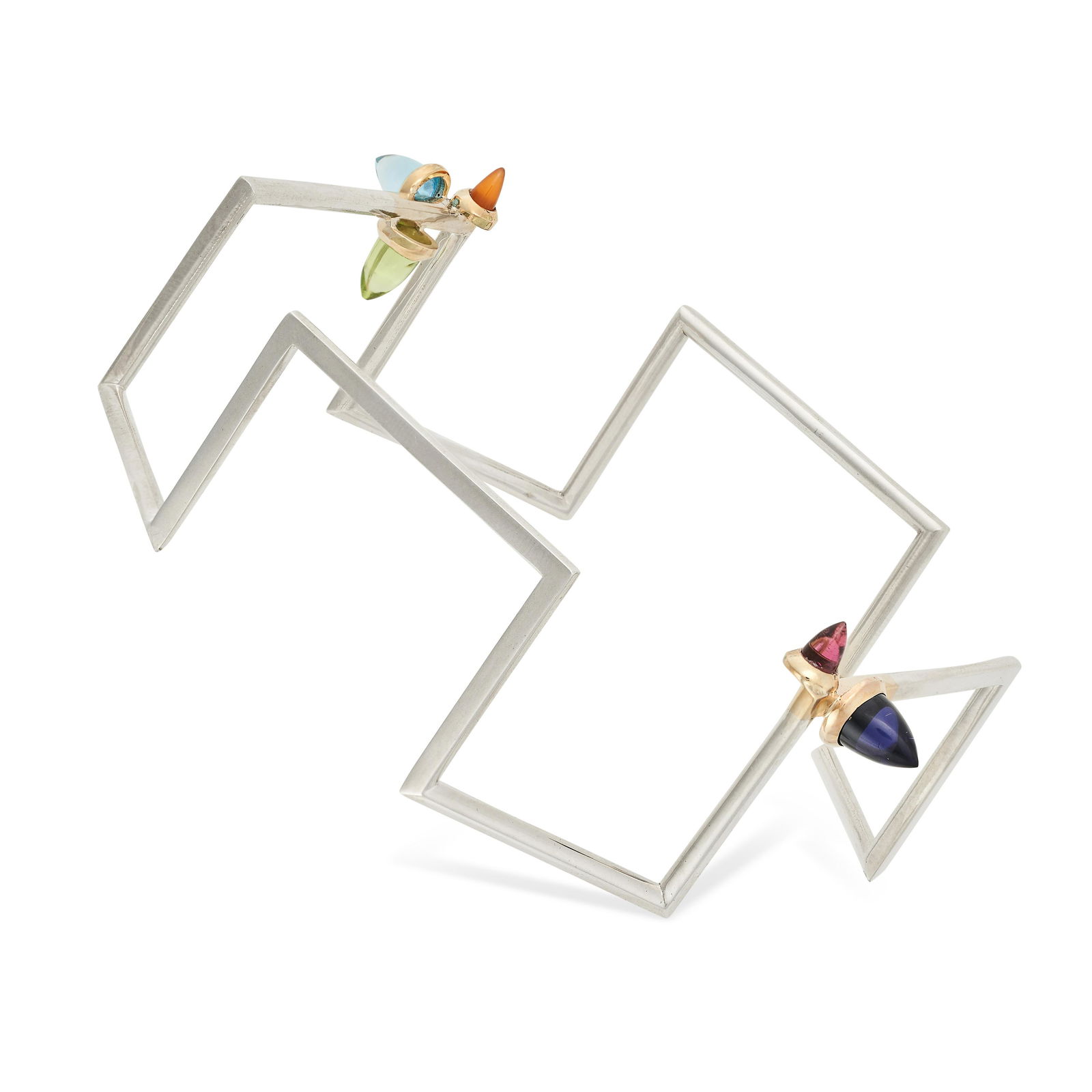 A GEMSET GEOMETRIC BANGLE in geometric design, terminating with a cabochon peridot, topaz, (1 of 2)