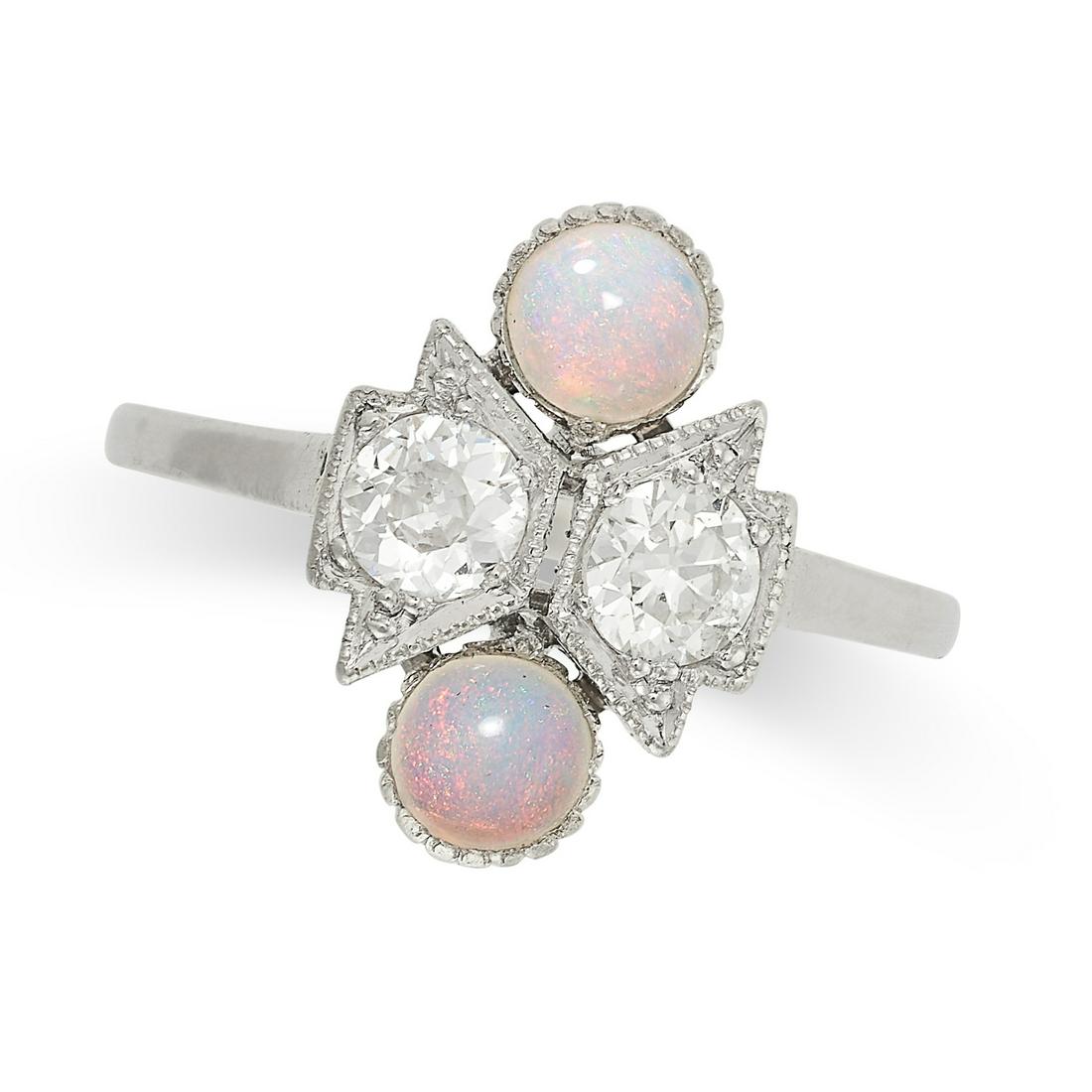 AN OPAL AND DIAMOND DRESS RING in platinum, set with two cabochon opals and two old cut diamonds, (1 of 2)