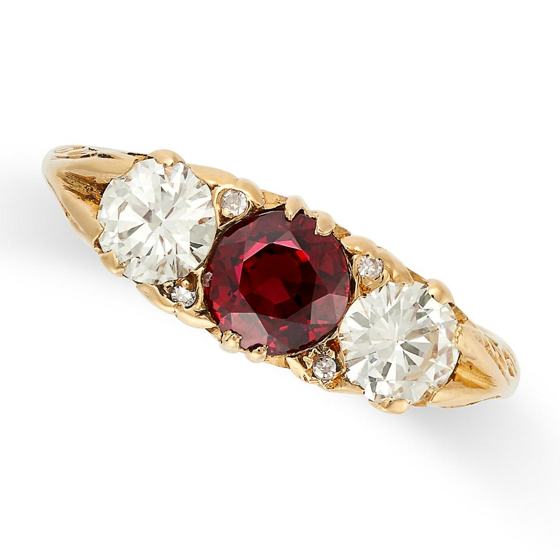 A VINTAGE THREE STONE RUBY AND DIAMOND RING in 18ct yellow gold, set with a round cut ruby of (1 of 2)