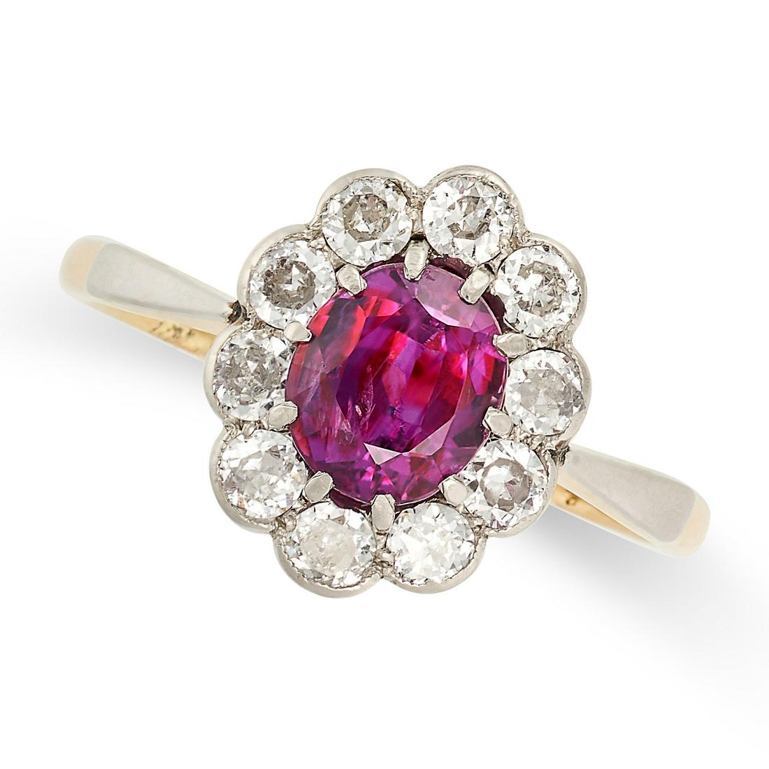 AN UNHEATED RUBY AND DIAMOND CLUSTER RING in 18ct yellow gold and platinum, set with an oval cut (1 of 2)