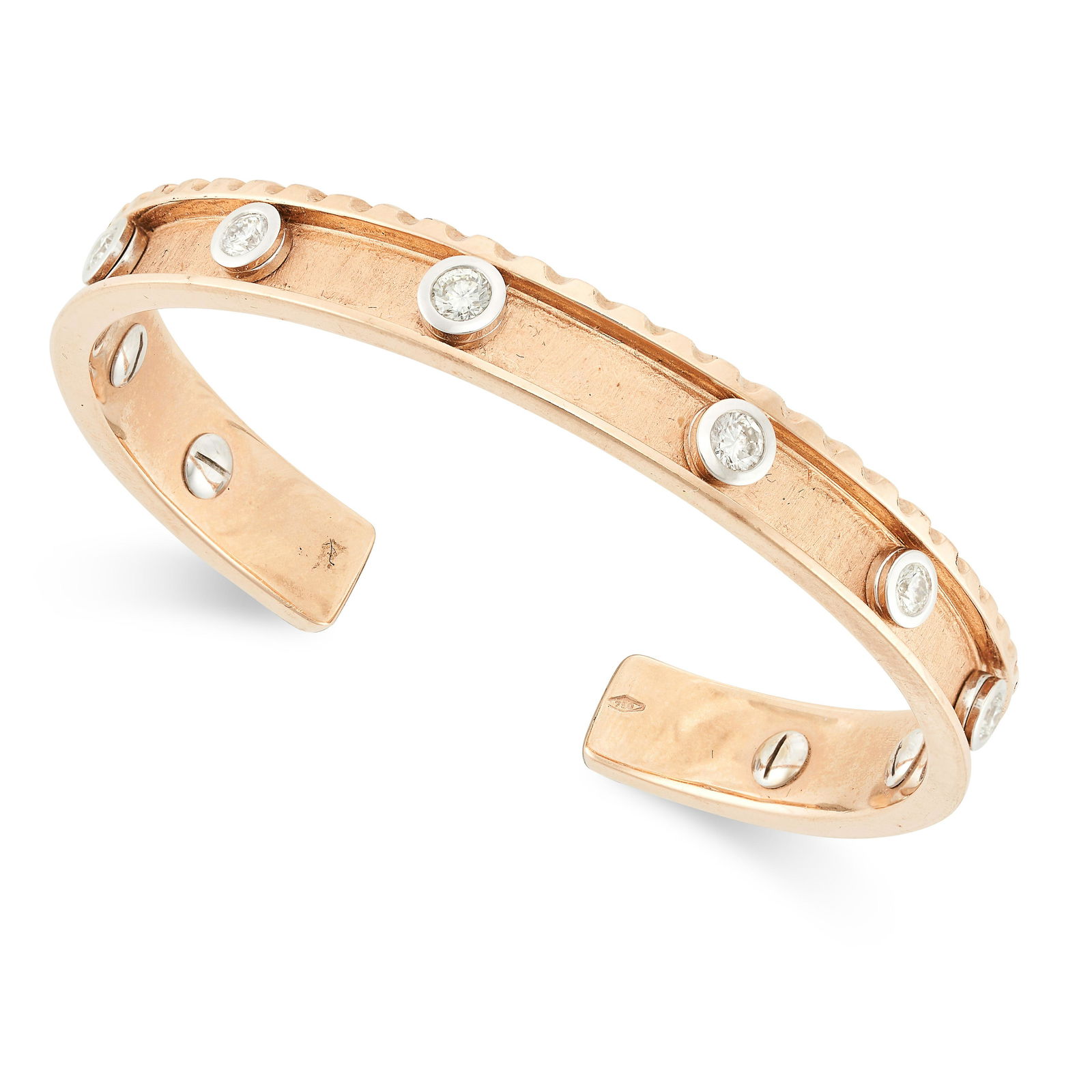 A DIAMOND CUFF BANGLE in 18ct yellow gold, set with a row of nine round brilliant cut diamonds, (1 of 1)