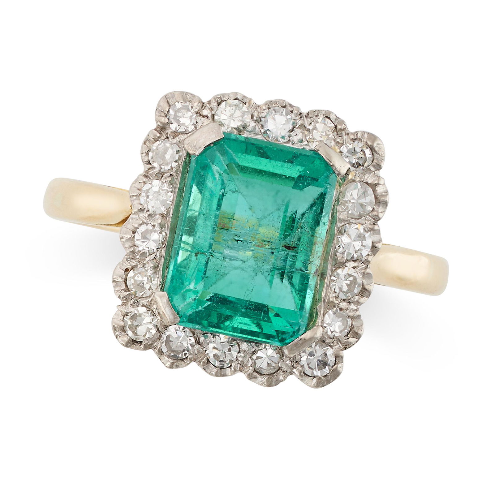 AN EMERALD AND DIAMOND CLUSTER RING in yellow gold and platinum, set with an octagonal step cut (1 of 1)