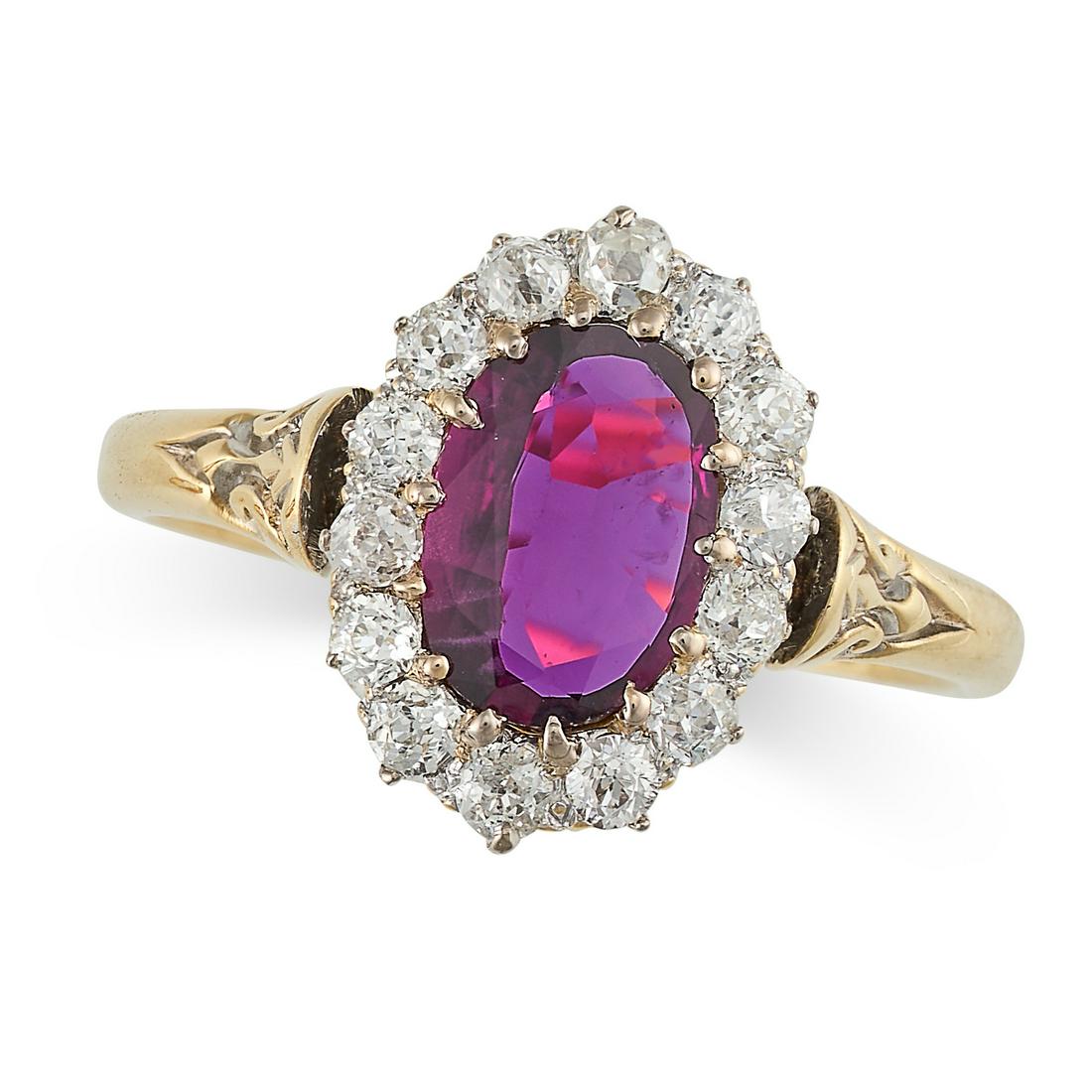 A RUBY AND DIAMOND CLUSTER RING in 18ct yellow gold, set with an oval cut ruby of approximately 1.03 (1 of 1)